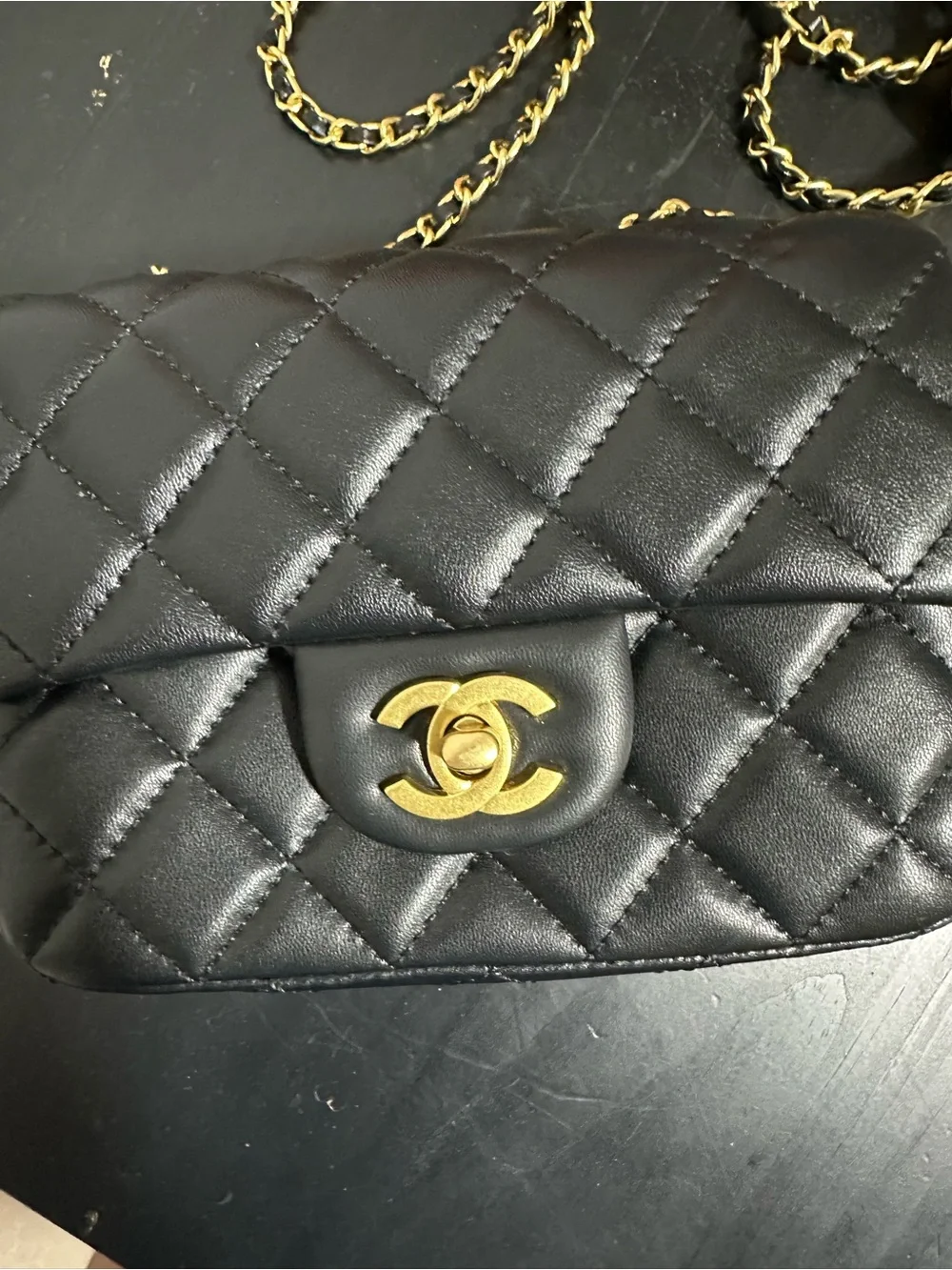 CHANEL Black Quilted Mini Crossbody with Gold Chain